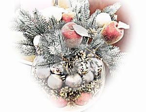 Christmas holidays composition with red apples, and silver balls on white