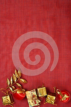 Christmas holidays composition on red texture background with copy space for your text