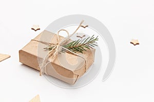 Christmas holidays gift box decorated with fir tree branch
