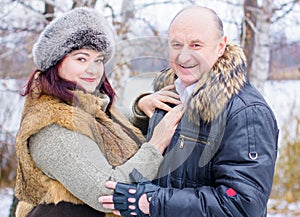 Christmas Holidays, woman and senior man walk at park