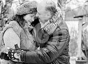 Christmas Holidays, woman and senior man walk at park