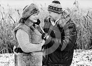 Christmas Holidays, woman and senior man walk at park