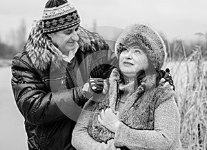 Christmas Holidays, woman and senior man walk at park