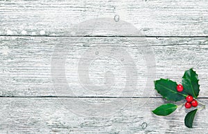 Christmas holly with wood texture