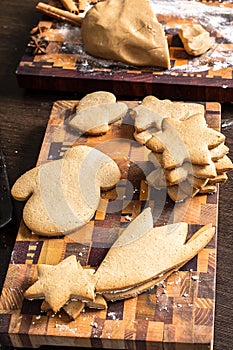 Christmas homemade gingerbread cookies on a cutting board