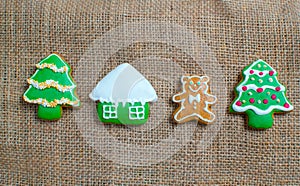Christmas homemade gingerbread cookies over wooden