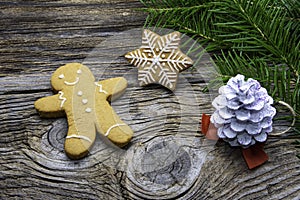 Christmas homemade gingerbread cookies over wooden table