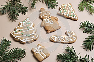 Christmas homemade gingerbread cookies with pine twigs