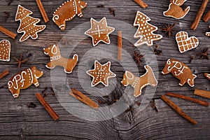 Christmas homemade gingerbread cookies on wooden background