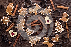 Christmas homemade gingerbread cookies on wooden background