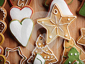 Christmas homemade gingerbread cookies on wooden background