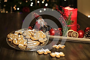 Christmas homemade gingerbread cookies on wooden table