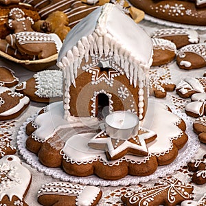 Christmas homemade gingerbread house with candle