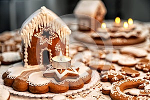 Christmas homemade gingerbread house with candle