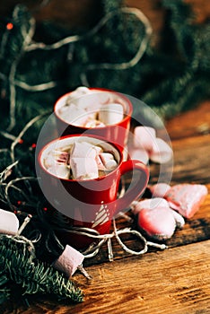 Christmas Hot Chocolate with Marshmallows in Red Mugs, square