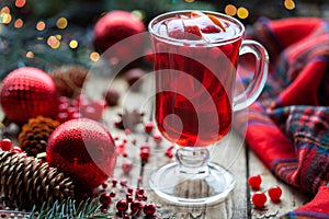Christmas hot cranberry mulled wine, orange pomegranate punch or sangria. Closeup. Winter decorations.