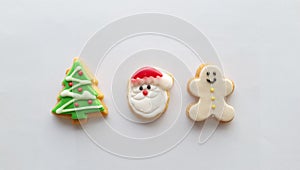 Christmas icon decoration on butter cookies on white background