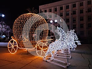 Christmas illumination of horse carriage.