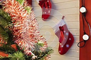 Christmas interior festive space with red socks on wall cozy warm atmosphere in December holidays happy season