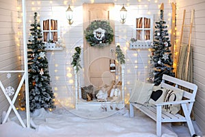 Christmas interior for a photo shoot in white colors.