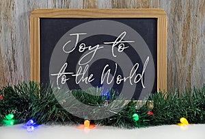 Christmas joy to the world greeting on chalkboard