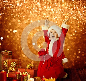 Christmas Kid, Happy Child Presents Gifts, Red Santa Bag, Boy Arms up photo