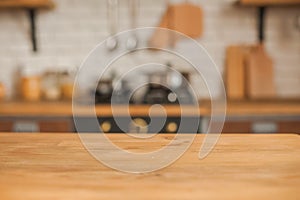 Christmas kitchen decor and copy space. Rustic kitchen in defocus. Wooden table in focus