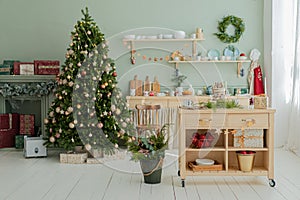 Christmas kitchen decorations with classic Christmas tree in silver and Golden colors