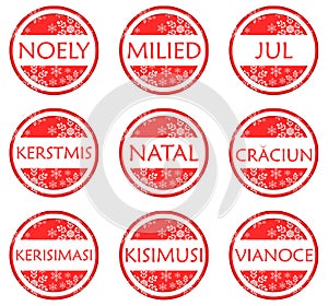 Christmas labels in different languages, christmas, red, isolated. photo