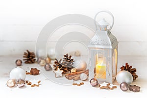 Christmas lantern with burning candle light and decoration like