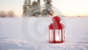Christmas lantern in evening winter forest. New Year and Christmas holiday, magic natural background. festive winter season