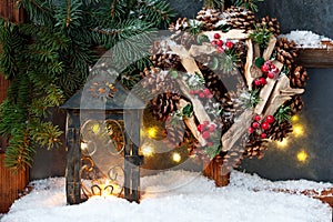 Christmas lantern of fire and winter sill with frost window background