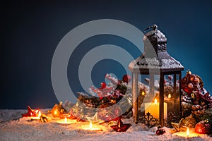 Christmas lantern in snow