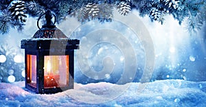 Christmas Lantern On Snow With Fir Branch photo