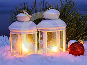 Christmas Lantern On Snow With Fir Branch In Evening Scene