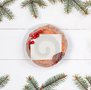 Christmas letter for Santa on stump on white wooden background with Fir branches and decorations. Xmas and Happy New Year