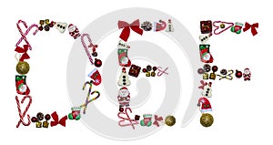 Christmas letters DEF made of New Year`s candies and decorations