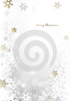 Christmas light background with golden and white snowflakes.
