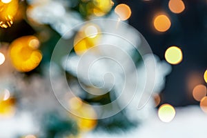 Christmas light background. Holiday glowing backdrop. Defocused background with blurred bokeh