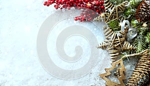 Christmas Light background. Xmas tree with snow decorated with g