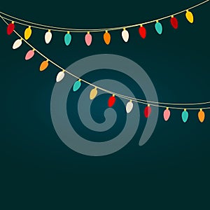 Christmas light bulb garland with multicolored rainbow lights on dark navy background. New Year card banner template