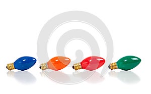 Christmas light bulbs on white