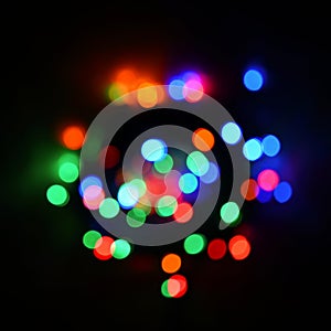 Christmas lights. Beautiful colorful blurred abstract background with Christmas tree decorations. Concept for winter and holidays