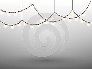 Christmas lights on grey background. Vector xmas glowing garland.