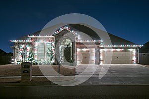 Christmas lights outside on a home photo