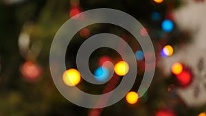 Christmas lights, shimmering golden warm circles defocused. Blurred fairy lights. Out of focus holiday background. Light