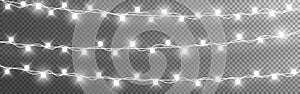 Christmas lights string. Silver garlands on transparent background. Luminous light bulbs for poster. Realistic glowing