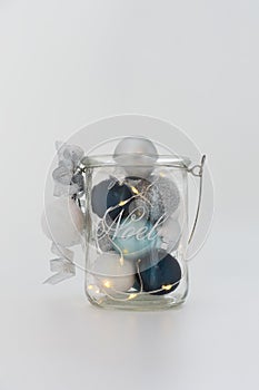 Christmas Lights, White, Silver, and Blue Balls in Glass Jar