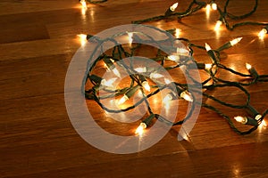 Christmas Lights on wood floor