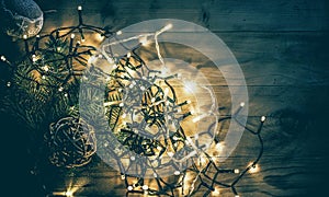 christmas lights on wooden vintage background